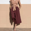 FJØRNA women's linen wide-leg trousers with drawstring waist and pull-on design, relaxed fit, lightweight and breathable fabric.