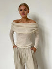 FJØRNA ribbed knit off-shoulder women’s top with mock neck, stylish and fitted for casual or dressy wear.
