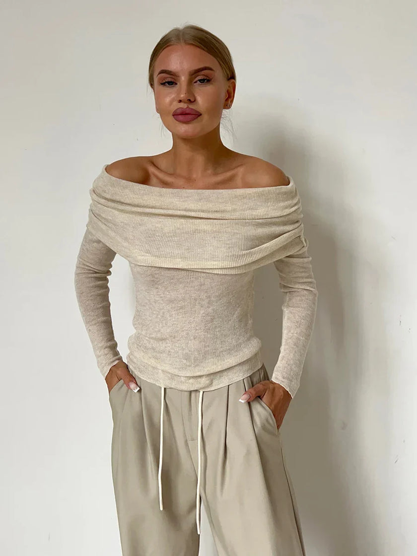 FJØRNA ribbed knit off-shoulder women’s top with mock neck, stylish and fitted for casual or dressy wear.