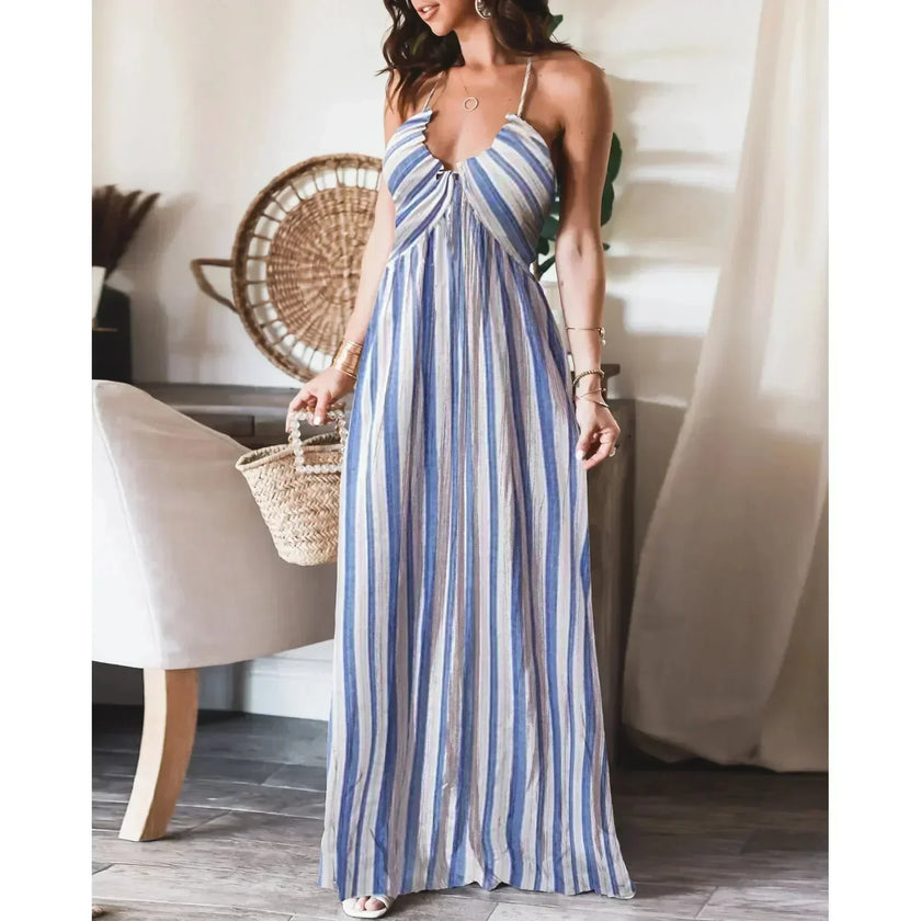 FJØRNA white sleeveless long dress, elegant and flowing, perfect for summer or formal occasions, shown on a model