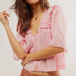 FJØRNA cream cropped cotton blouse with lace trim, women's white top featuring short sleeves and delicate lace details.