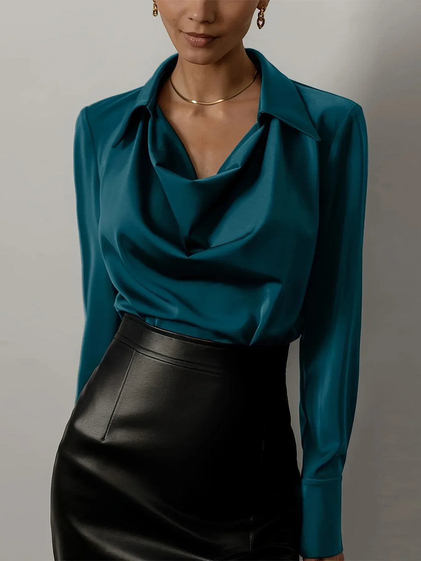FJØRNA satin cowl-neck long-sleeve white blouse for women, elegant top with smooth fabric and draped neckline.