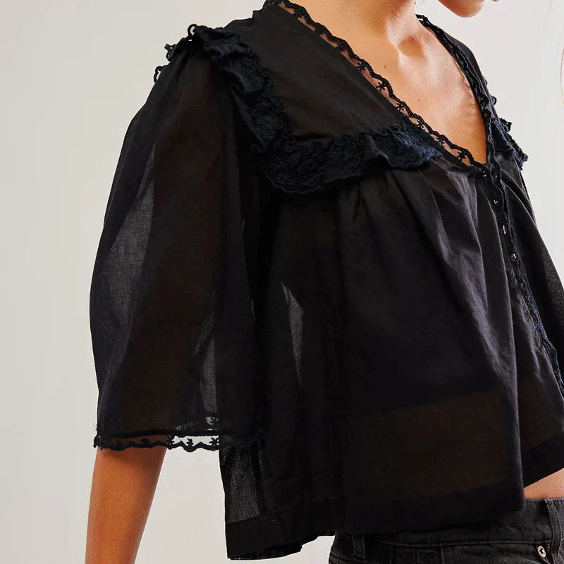FJØRNA cream cropped cotton blouse with lace trim, women's white top featuring a stylish and feminine design.