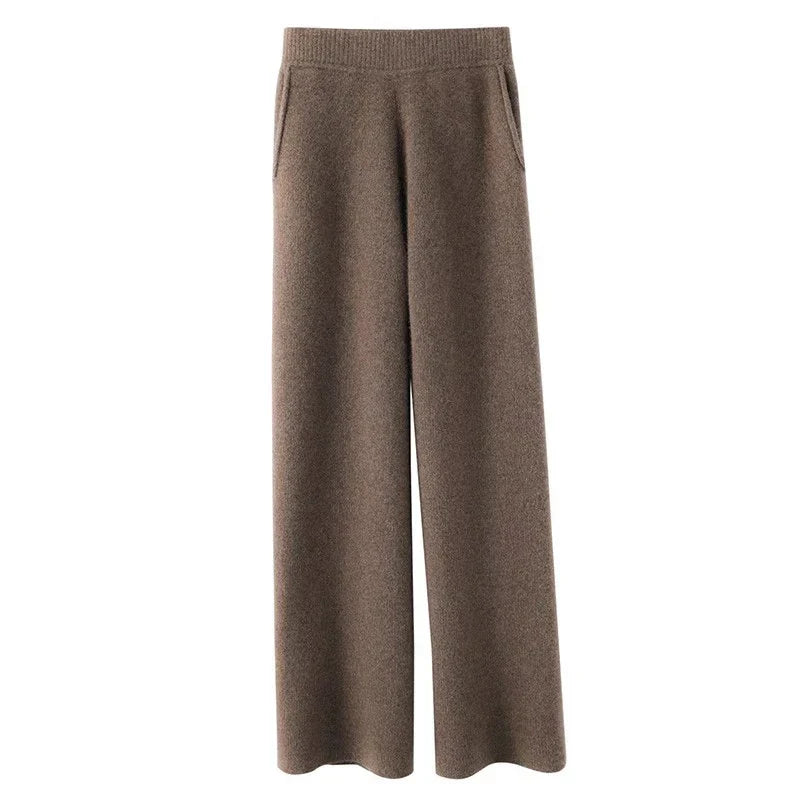 Women’s FJØRNA jogger pants featuring a comfortable fit and casual style, shown in a relaxed, stylish pose.