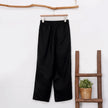 Women’s cotton linen wide-leg trousers by FJØRNA featuring a drawstring pull-on design, relaxed fit, and flowing wide-leg silhouette.