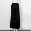 FJØRNA cotton linen wide-leg women's trousers with drawstring pull-on design, showcasing relaxed fit and casual style.