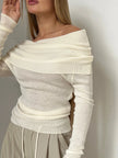 FJØRNA ribbed knit off-shoulder top for women featuring a mock neck and fitted design, shown in a neutral color.