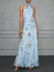 FJØRNA jasmine floral halter wedding guest dress with a flowing silhouette and delicate floral print, perfect for special occasions
