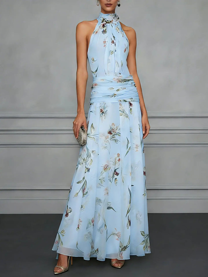 FJØRNA jasmine floral halter wedding guest dress with a flowing silhouette and delicate floral print, perfect for special occasions