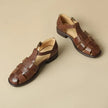 FJØRNA brown Italian leather women's adjustable strap sandals with open toe and flat sole, stylish and comfortable for warm weather.