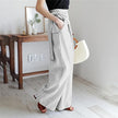 Women's high-waist cotton wide-leg trousers by FJØRNA, loose pull-on pants with relaxed fit and comfortable design.