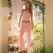 Women’s loose knit wide-leg trousers by FJØRNA, pull-on style, soft and comfortable for casual or stylish wear.