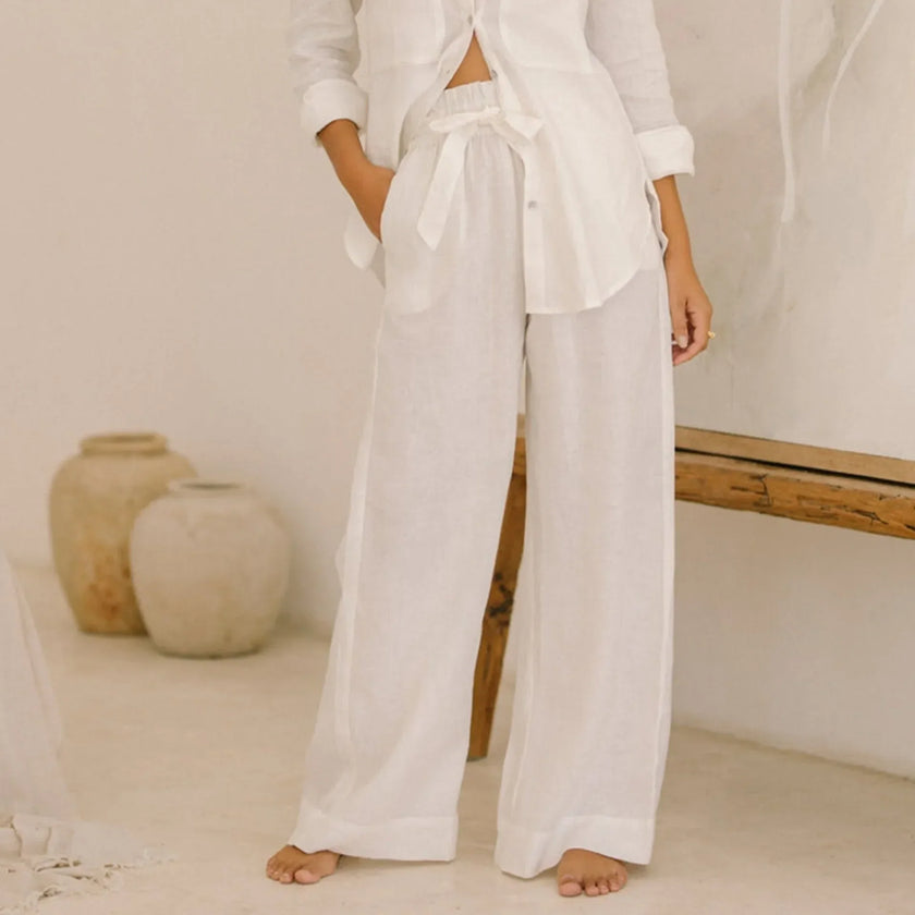 FJØRNA linen wide-leg pull-on trousers for women, loose fit, light-colored, lightweight fabric, casual style, full-length view