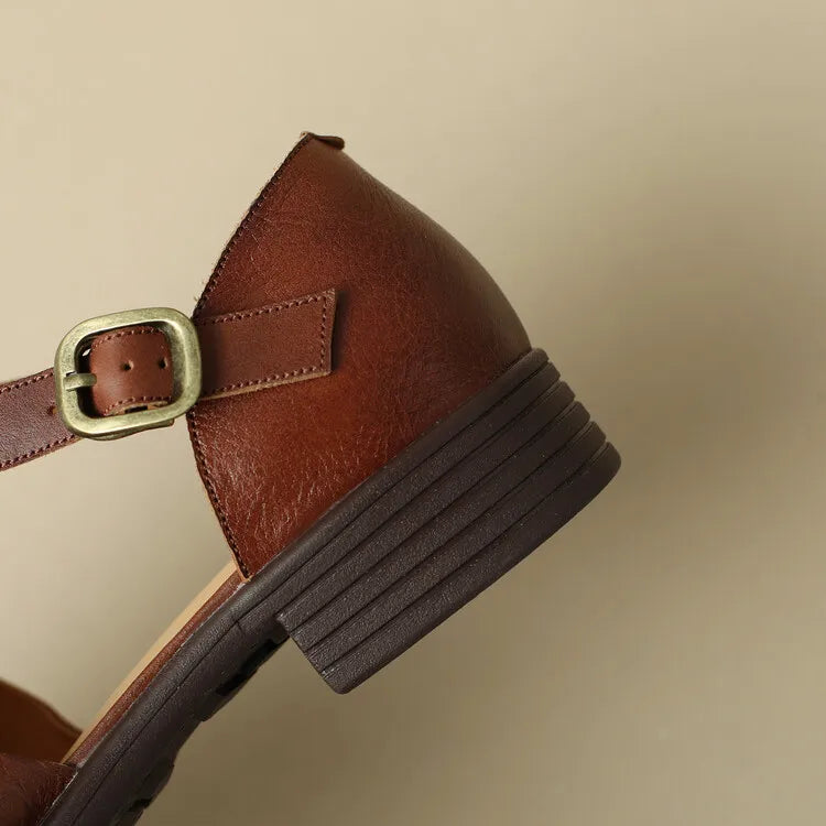 FJØRNA women's brown Italian leather adjustable strap sandals with open toe design and flat sole.