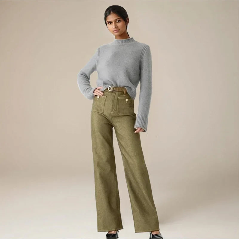 Women’s wide-leg cotton jeans by FJØRNA with high waist and relaxed fit, shown in a front view on a neutral background.