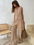 FJØRNA women's linen wide-leg trousers, stylish and comfortable pants for women, part of a co-ord set, shown in neutral fabric.