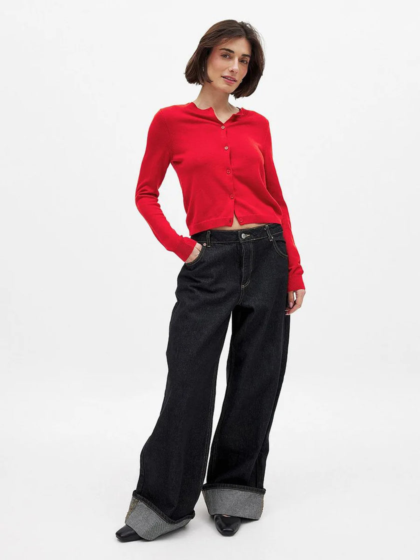 FJØRNA longline women's knit cardigan with button-front design, soft fabric, and relaxed fit, styled as a casual women's top.
