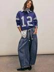 Women’s wide-leg cotton jeans with drawstring waist by FJØRNA, featuring a relaxed fit and casual style.