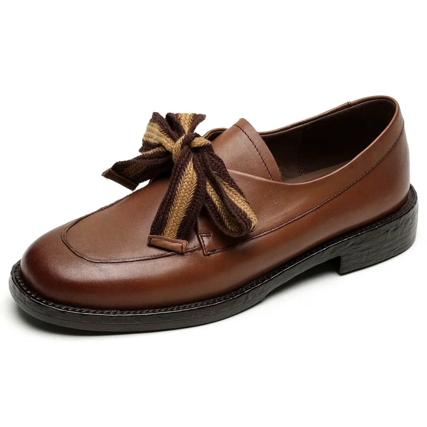 Women’s dual-tone leather loafers by FJØRNA featuring handcrafted design and cushioned insoles for comfortable style.