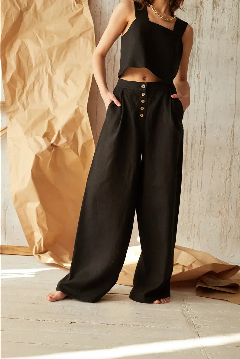 FJØRNA women's knit wide-leg trousers with loose pull-on design, soft fabric, and relaxed fit, perfect for casual wear.
