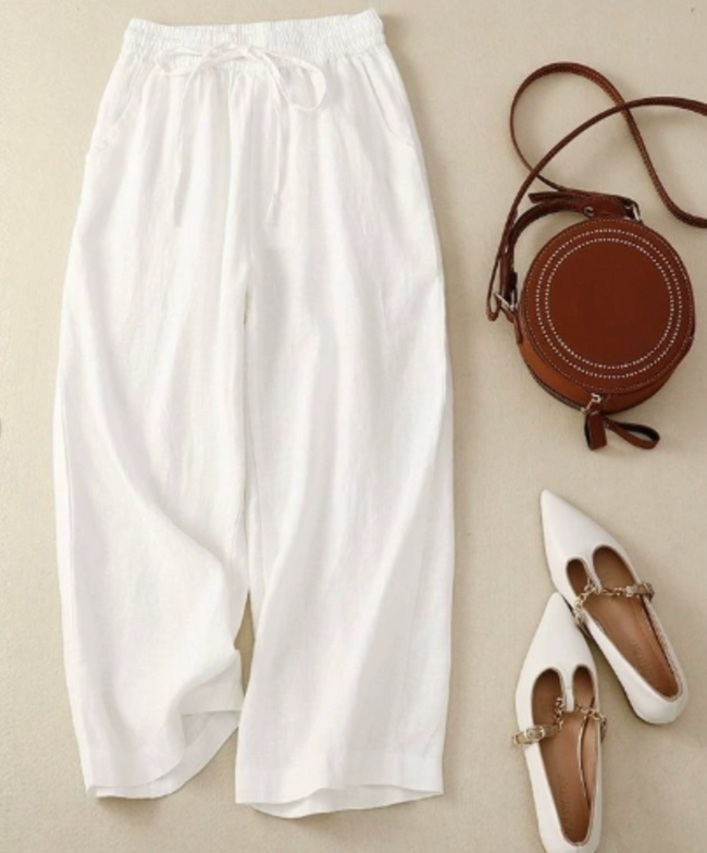 FJØRNA lightweight summer women's wide-leg trousers, breathable and flowy, perfect for casual warm-weather outfits.