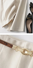 Wide-leg wool trousers for women by FJØRNA, high-waist design with a tailored fit, perfect for a stylish, comfortable look.