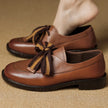 FJØRNA women's dual-tone leather loafers with handcrafted design and cushioned insoles, showcasing stylish footwear for women.