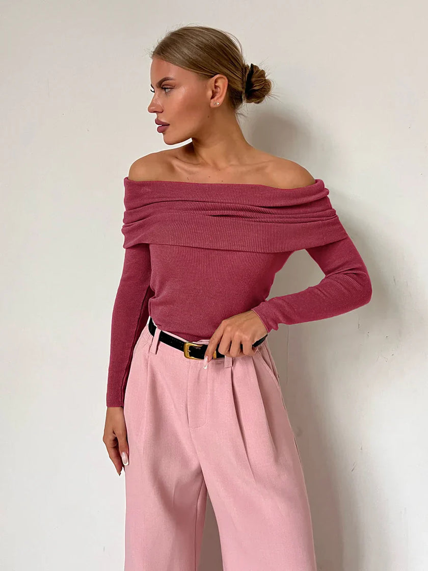 FJØRNA ribbed knit off-shoulder women's top with mock neck, featuring a fitted, stylish design and long sleeves.