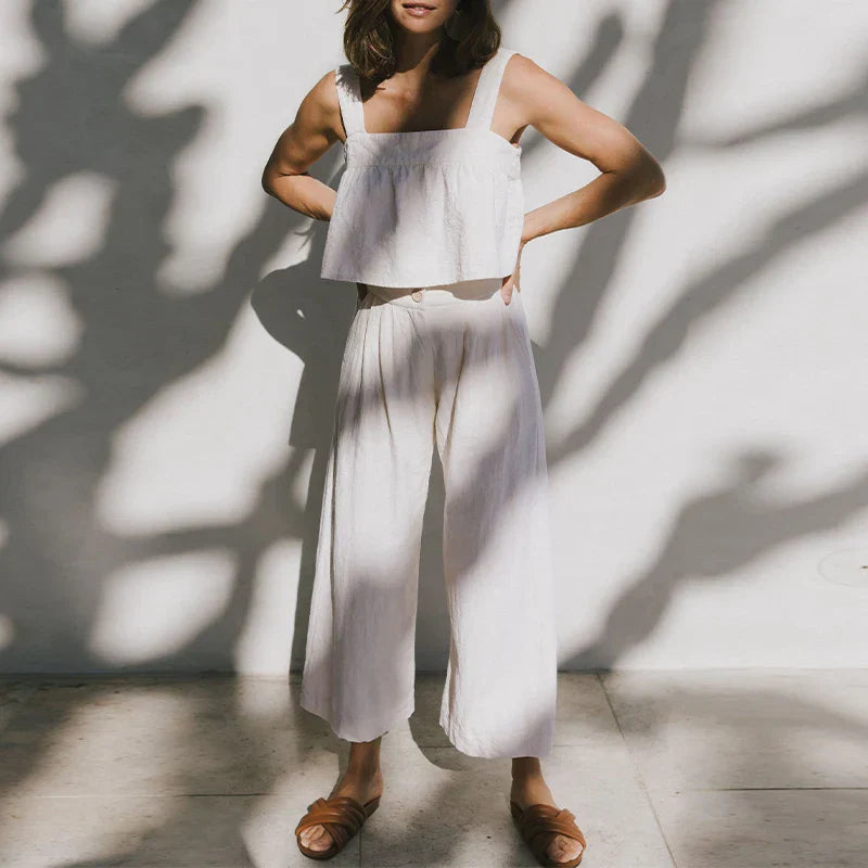 FJØRNA women's linen cropped culotte trousers with wide-leg design, lightweight and breathable for casual or stylish wear.