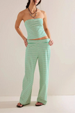 Women's loose knit wide-leg trousers by FJØRNA, comfortable pull-on pants with a relaxed fit and cozy knit fabric.