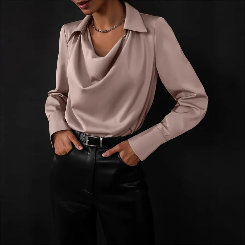 FJØRNA women's white satin cowl-neck long-sleeve blouse, elegant and soft, showcasing the draped neckline and smooth fabric.