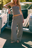 Women's loose knit wide-leg trousers by FJØRNA, pull-on style, shown in a relaxed fit and comfortable fabric.