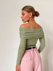 FJØRNA women's ribbed knit off-shoulder top with mock neck, stylish and fitted top for women, showcasing the textured fabric and neckline.