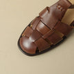 FJØRNA women's brown Italian leather adjustable strap sandals with open toe design and low heel.