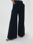 Blue denim wide-leg drawstring pants for women by FJØRNA, relaxed fit jeans with a comfortable waist and casual style.