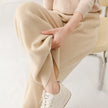 FJØRNA women's merino wool wide-leg joggers with relaxed fit and soft texture, perfect for comfortable casual wear.