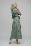 FJØRNA elegant floral maxi dress for women with halter neck and sleeveless design, perfect for summer or special occasions.