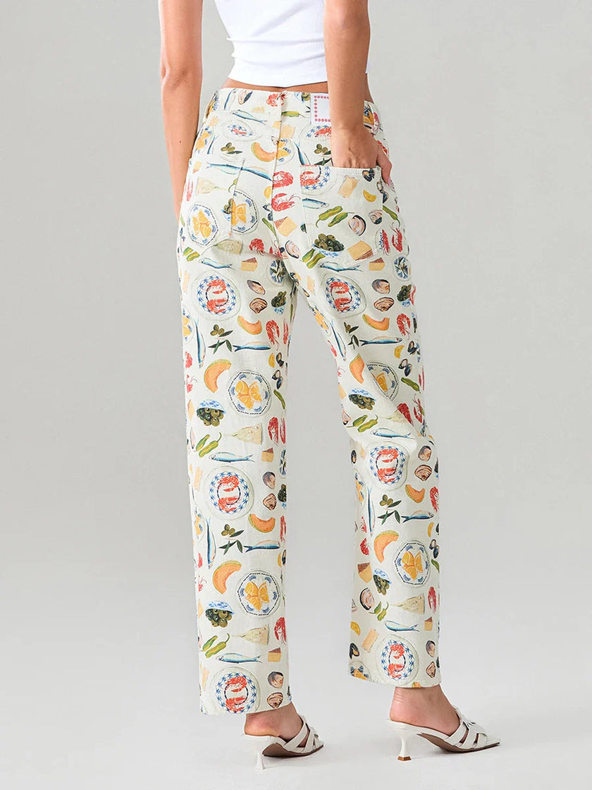 Women’s denim jeans by FJØRNA, stylish pants with classic blue denim, featuring a relaxed fit and five-pocket design.
