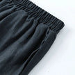FJØRNA linen wide-leg women's trousers with drawstring pull-on design, lightweight and comfortable for casual wear.