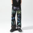Men's painted black trousers by FJØRNA, stylish and comfortable pants with a modern design, shown in a close-up view.