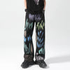 Men's painted black trousers by FJØRNA, stylish and comfortable pants with a modern design, shown in a close-up view.