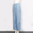 FJØRNA cotton linen wide-leg women's trousers with drawstring waist and pull-on design, showcasing relaxed, comfortable fit.