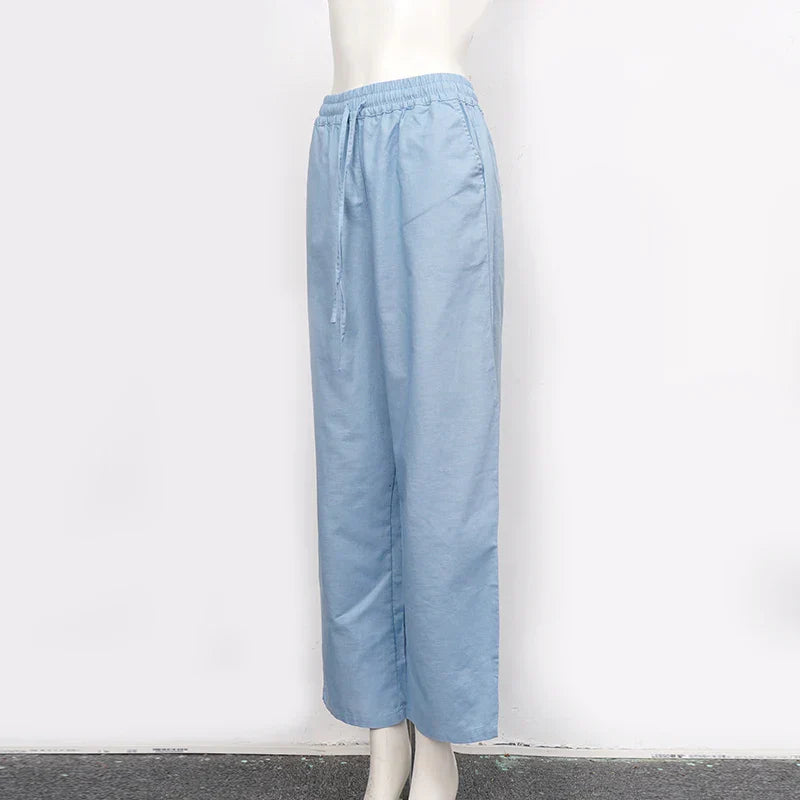 FJØRNA cotton linen wide-leg women's trousers with drawstring waist and pull-on design, showcasing relaxed, comfortable fit.