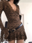 Sheer lace mini dress for women by FJØRNA, perfect for party or daytime wear, featuring delicate lace details and a fitted silhouette.