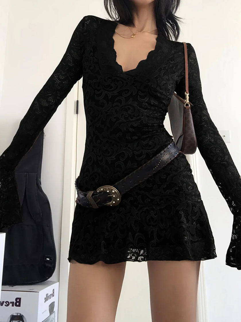 FJØRNA sheer lace mini dress for women, featuring delicate lace fabric, perfect for party or daytime occasions.