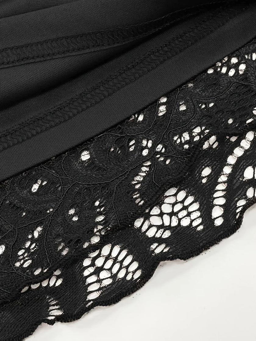 FJØRNA sheer lace women's mini dress with long sleeves, perfect for party and day wear, featuring delicate floral lace details.