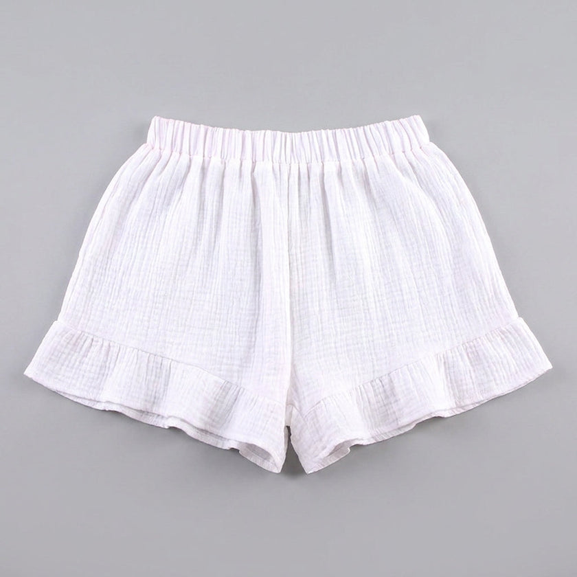 FJØRNA summer two-piece women's co-ord set with ruffle detail, featuring relaxed fit shorts and matching top.