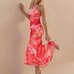 Side view of FJØRNA elegant one-shoulder maxi dress for women, featuring a fitted bodycon silhouette and stylish design.