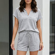 Silver gray women's summer two-piece co-ord set by FJØRNA with pockets and V-neck, casual matching outfit for warm weather.