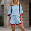 Sky blue women's summer two-piece co-ord set with drawstring off-shoulder top and matching shorts by FJØRNA.
